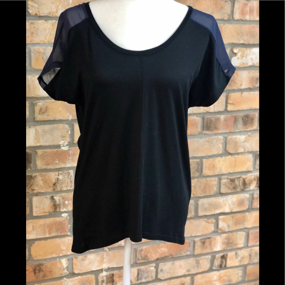 Black top with sheer navy back